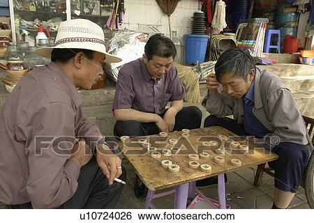 Stock Photograph - playing, person, males, men, china, people. Fotosearch