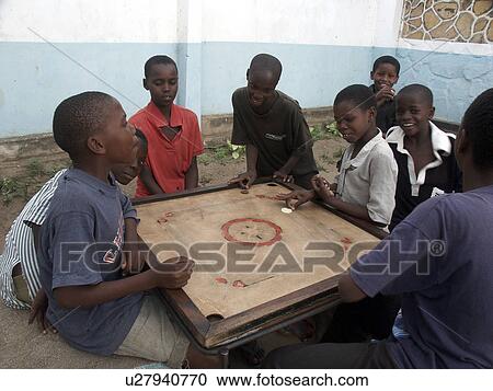 Stock Image - playing, sport, boys, tanzania, person, people. Fotosearch