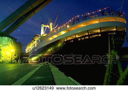 Stock Photo - port, oceanliner, huge, ship, night, docked. Fotosearch