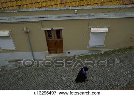 Stock Photo - rooftop, street, road, portugal, lisbon, cobblestone. Fotosearch