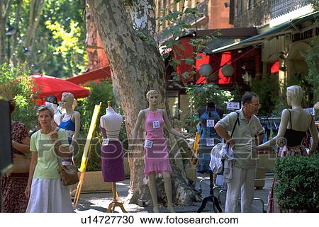 Stock Image - scene, shopping, street, pedestrians, mannequins, fashion. Fotosearch
