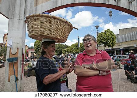 Stock Photo - sharing, person, females, guatemala, women, people. Fotosearch