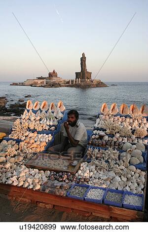 Stock Photo - shells, person, selling, stall, india, people. Fotosearch