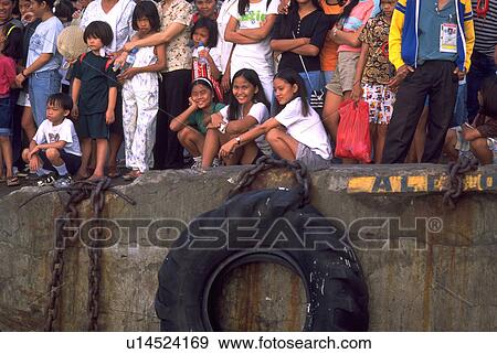 Stock Photo - ship, children, see, waits, crowd, family. Fotosearch