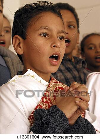 Picture - singing, person, boy, egypt, 8015, people. Fotosearch