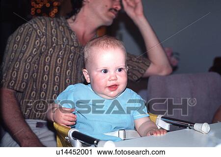 Stock Image - sitting, released, excited, boy, baby, model. Fotosearch