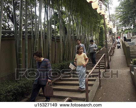 Stock Photo - temple, person, buddhist, steps, japan, people. Fotosearch
