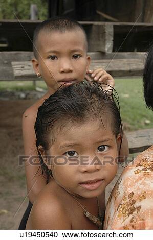 Stock Image - thom, person, kampong, girls, cambodia, people. Fotosearch