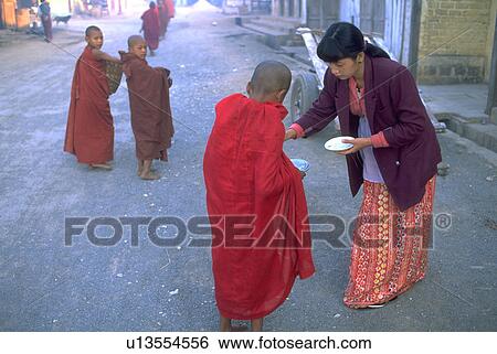 Stock Photograph - through, young, walk, monks, buddist, food. Fotosearch