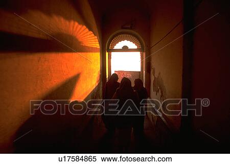 Stock Photography - wall, sun, reflected, hindu, shadows, people. Fotosearch