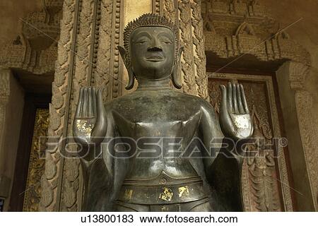 wat, person, statue, buddha, laos, people View Large Photo Image Stock Image - wat, person, statue, buddha, laos, people. Fotosearch