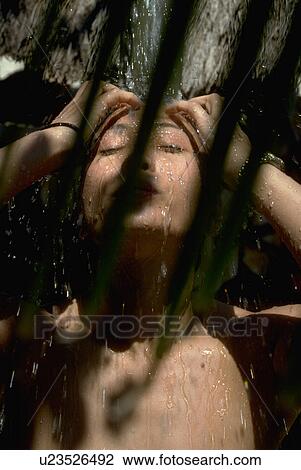 Stock Image - water, splashing, female, philippine, woman. Fotosearch
