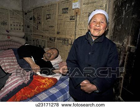 Stock Photo - woman, person, house, people, family. Fotosearch
