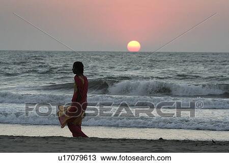 Stock Image - women, beach, sun, person, people, woman. Fotosearch