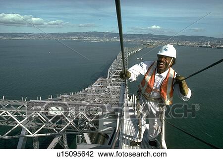 Stock Image - workman, black, bridge, bay, construction. Fotosearch