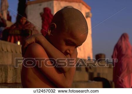 Stock Image - allahabad, hindu, set, resting, boy, sun. Fotosearch