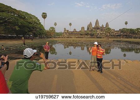 Stock Photo - angkor, person, visiting, tourists, cambodia, people. Fotosearch