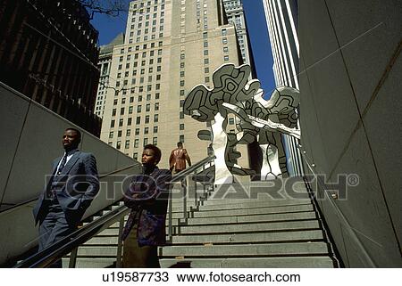Stock Image - area, spring, downtown, sculpture, art, people. Fotosearch
