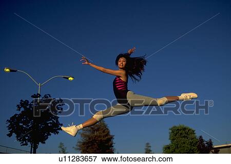 Stock Photo - athletic, people, leaping, dancer, fitness, fashion. Fotosearch