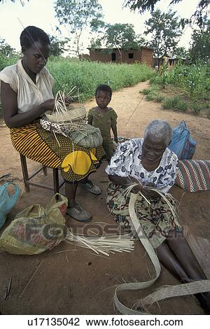 Stock Image - baskets, person, making, tanzania, women, people. Fotosearch