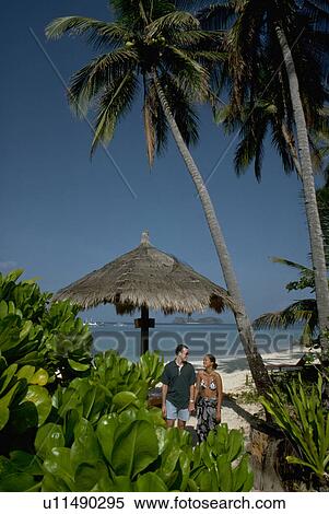 beach, standing, lovers, couple, woman View Large Photo Image Stock Photography - beach, standing, lovers, couple, woman. Fotosearch