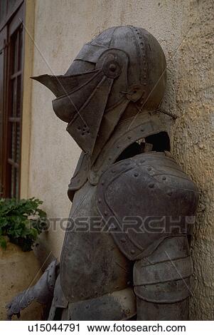 Stock Image - bisbal, knight, wall, stands, armor, antique. Fotosearch