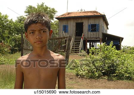 boy, house, cambodia, home, person, people View Large Photo Image Stock Image - boy, house, cambodia, home, person, people. Fotosearch