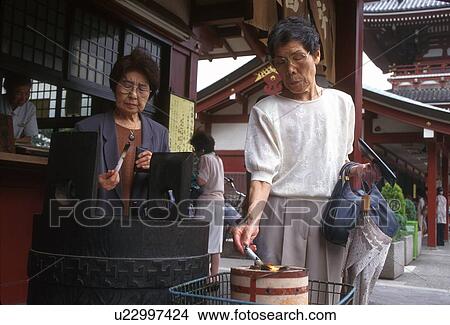 Picture - burner, person, incense, japan, 3211, people. Fotosearch