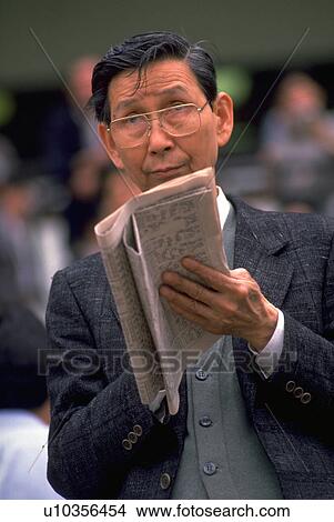 businessman, people, asian, paper, money, business View Large Photo Image Picture - businessman, people, asian, paper, money, business. Fotosearch