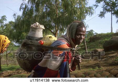 carrying, ethiopia, carry, female, women, 3949 View Large Photo Image Stock Photo - carrying, ethiopia, carry, female, women, 3949. Fotosearch