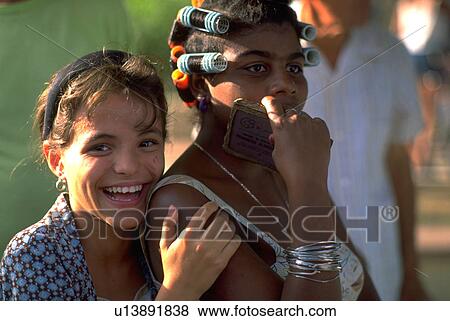 Stock Photo - cuba, love, friends, home, people, family. Fotosearch
