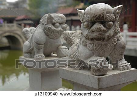 Stock Image - dogs, person, guard, ornamental, china, people. Fotosearch