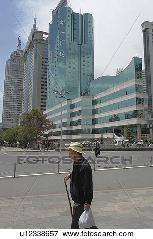 Stock Photo - downtown, person, scene, street, china, people. Fotosearch