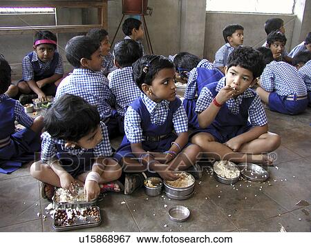 eating, person, india, children, school, people View Large Photo Image Stock Photo - eating, person, india, children, school, people. Fotosearch