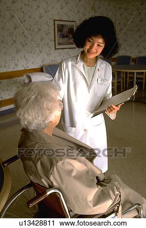 Stock Image - female, hand, american, filipino, home, woman. Fotosearch