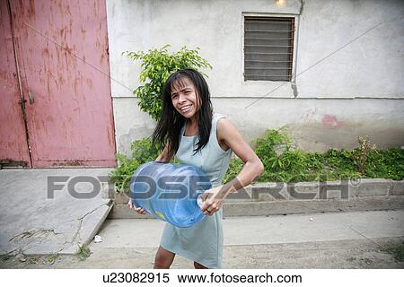 Stock Photography - female, water, honduras, person, people, woman. Fotosearch