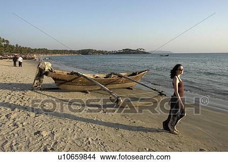 Picture - fishing, people, tourist, india, person, beach. Fotosearch
