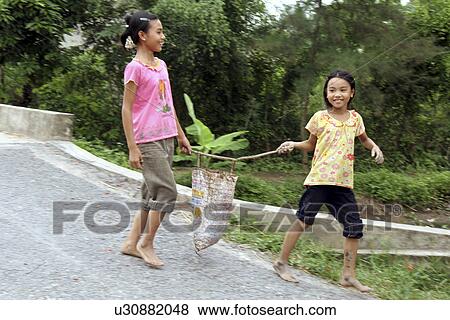 Stock Photo - girls, sport, vietnam, children, person, people. Fotosearch