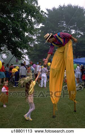 Stock Image - gracious, children, stilts, performer, circus, party. Fotosearch