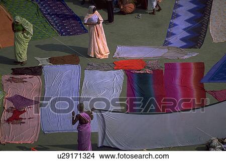 ground, worshipers, saris, colored, spreading, hindu View Large Photo Image Picture - ground, worshipers, saris, colored, spreading, hindu. Fotosearch