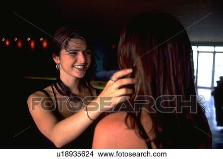 hair, hand, friends, fixing, girl, woman View Large Photo Image Picture - hair, hand, friends, fixing, girl, woman. Fotosearch