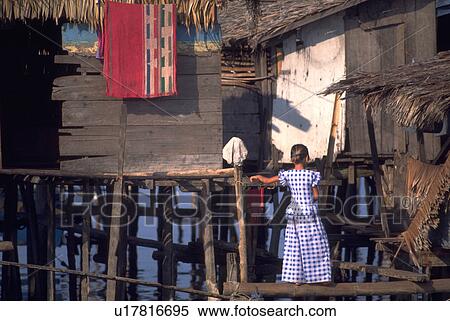 Stock Photography - house, filipino, home, girl, water. Fotosearch