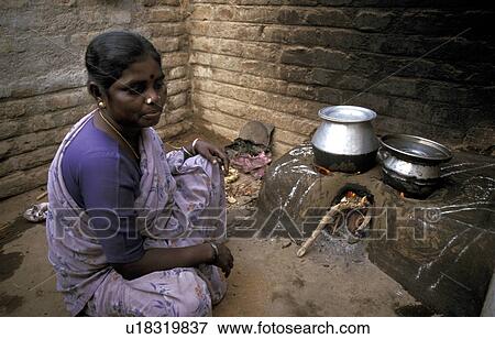 Stock Photo - india, people, home, person, house, woman. Fotosearch