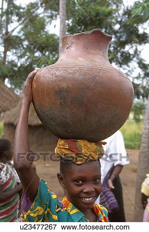 issenye, tanzania, pot, carrying, girl, 3912 View Large Photo Image Stock Photo - issenye, tanzania, pot, carrying, girl, 3912. Fotosearch