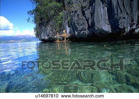 jagged, makeshift, towering, alongside, dock, water View Large Photo Image Stock Image - jagged, makeshift, towering, alongside, dock, water. Fotosearch