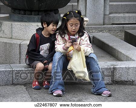 Stock Photo - japan, people, children, person, sport, computer. Fotosearch
