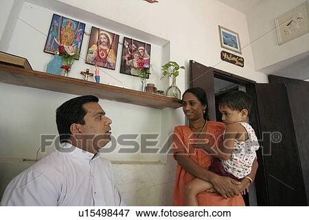 Stock Photo - joy, person, father, india, home, people. Fotosearch