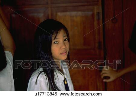 Stock Photography - kid, looks, child, girl, photographer, student. Fotosearch