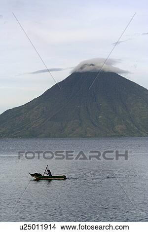 Picture - lake, people, scenes, guatemala, person, water. Fotosearch