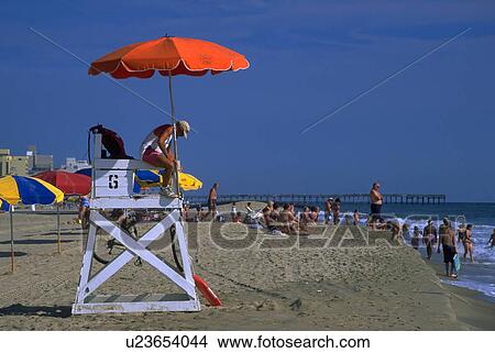 Picture - lifeguard, umbrellas, sun, protective, bright. Fotosearch